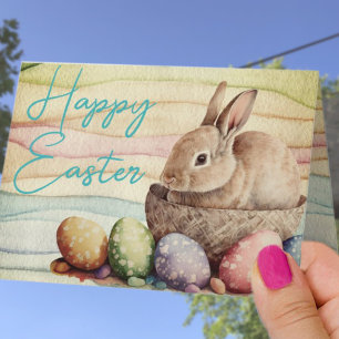 Niedliches Kaninchen in einem Korb Feiertagskarte