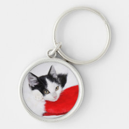 Niedliches Kätzchen in der Weihnachtsmannmütze Schlüsselanhänger