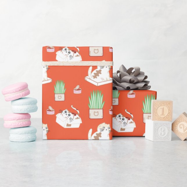 Niedliches Kittmuster in rotem Umschlagpapier Geschenkpapier (Babyparty)