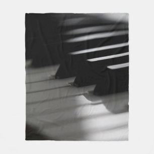 Niedliches Klavier Fleecedecke