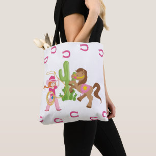 Niedliches kleines Cowgirl und Pony