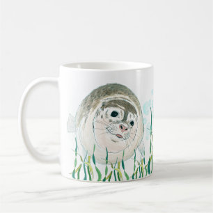 Niedliches Lächeln Baby Siegel zeichnend sagt gute Kaffeetasse