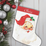 Niedliches Mittelalter Vintag Santa Personalisiert Großer Weihnachtsstrumpf<br><div class="desc">Dieser bezaubernde Weihnachtsfest-Strumpf ist ein nostalgisches Zeichen für den Feiertagssjubiläum der Mitte des Jahrhunderts, mit einem herrlichen Vintagen Weihnachtsbild, das Wärme und Freude ausstrahlt. Die Vorderseite zeigt den Weihnachtsmann in seinem klassischen roten Anzug mit rosigen Wangen und einem Augenzwinkeln, der den zeitlosen Geist der Weihnachtsgeschichte einfängt. Oben wird Ihr Name...</div>