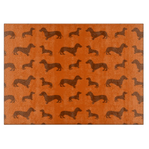 Niedliches orange Dackelmuster Schneidebrett