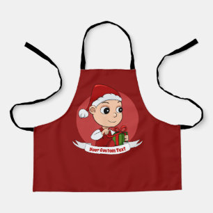 Niedliches Weihnachtsbaby mit Geschenk und Hut des Schürze