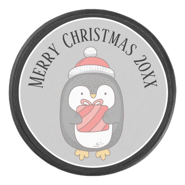 Niedliches Weihnachtspenquin mit Hut und Packung Eishockey Puck (Vorderseite)