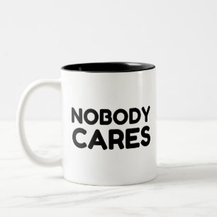 NIEMAND KÜMMERT SICH DARUM ZWEIFARBIGE TASSE