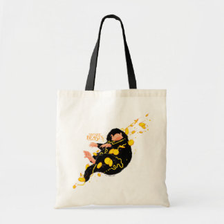 Niffler schwimmend mit Gold Tragetasche