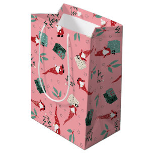 Nomaden mit Weihnachtsbäumen und Geschenke auf ros Mittlere Geschenktüte