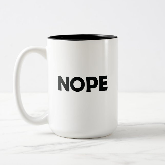 NOPE ZWEIFARBIGE TASSE (Links)