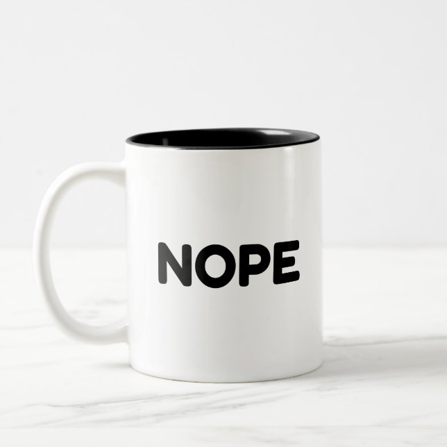 NOPE ZWEIFARBIGE TASSE (Links)
