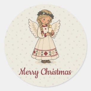Nordischer Weihnachtsengel mit Kerze für die Feier Runder Aufkleber