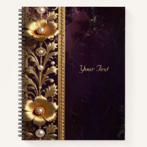 Notizbuch mit goldenem Blumenschmuck und Perlen