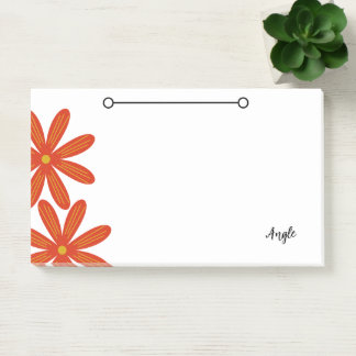 Notizen mit Blume und Namensschild