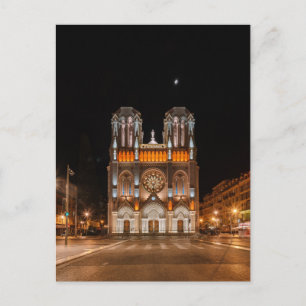 Notre-dame de nice in der Nacht glühend Postkarte