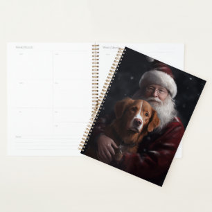 Nova Scotia Duck Toller mit dem Weihnachtsmann fei Planer