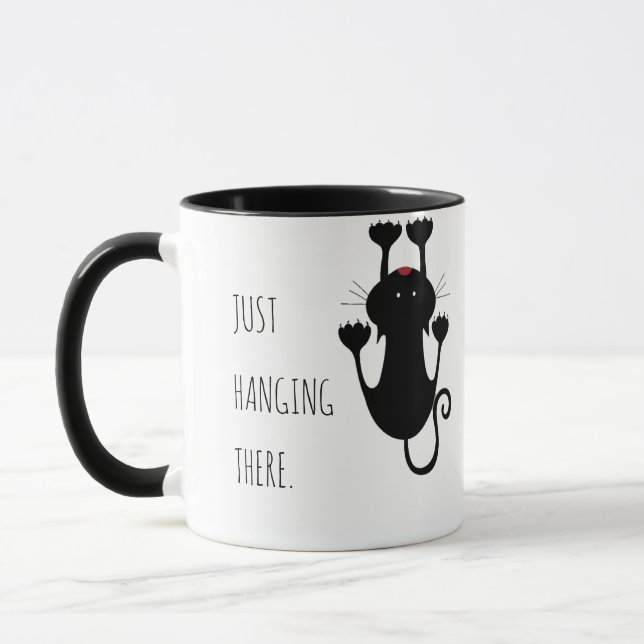 Nur da hängen schwarze Katze Cartoon lustiger Text Tasse (Links)