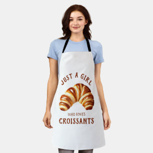 Nur ein Mädchen, das Croissants Lieben Schürze