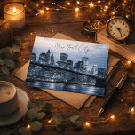 NYC Unforgettable Night Skyline  Postkarte<br><div class="desc">NYC: unforgettable, electric, and endlessly inspiring. This striking postcard captures the unforgettable beauty of the New York City skyline glowing against the night sky. The shimmering reflections dancing across the water create a dramatic and romantic view of Manhattan that perfectly reflects the energy of the city that never sleeps. Whether...</div>