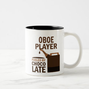 Oboe Spieler-(lustige) Schokolade Zweifarbige Tasse