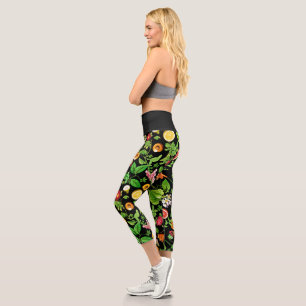 Obst- und Blätter-Muster auf schwarz Capri Leggings