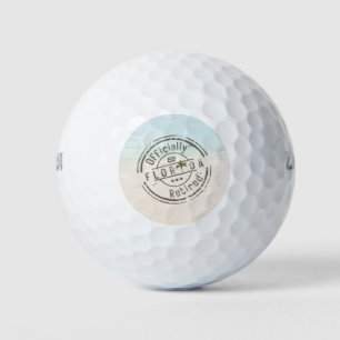 Offiziell im Ruhestand am tropischen Ozean Florida Golfball