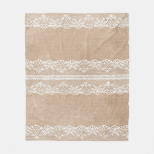 Offweiße Spitze auf Vintager Papiertextur mit subt Fleecedecke