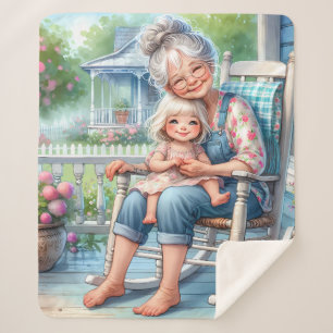 Oma und Enkelin umarmen sich auf der Veranda Sherpadecke