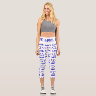 One Love Kunstmuster blau mit leichter Purpur-Note Capri Leggings