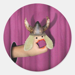 Operative Hand im Spotlight Runder Aufkleber