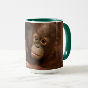 Orang-Utan-Mutter und Baby im Zoo Tasse