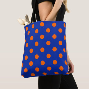 Orange auf blauem Punkte-Musterdesign