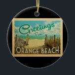 Orange Beach Vintage Travel Keramik Ornament<br><div class="desc">Dieses Greetings From Orange Beach Vintage Postkartendesign besticht durch einen Sandstrand mit türkisblauem Meerwasser und einen blauen Himmel mit blauen,  blauen Wolken. Im Vintage Reisen Stil.</div>