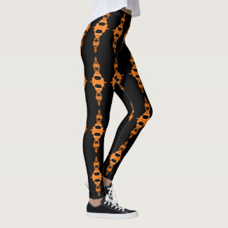 Orange der Muster-Teiler-03 über dem Schwarzen Leggings