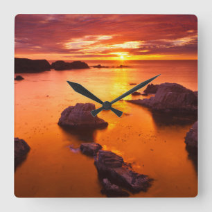 Orange seascape, sunset, California Quadratische Wanduhr