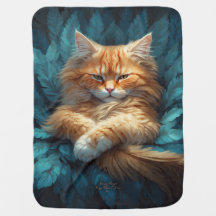 Orange Tabby Kitten in Bed of Blue Feathers