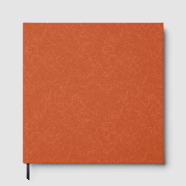 Orange textured surface with swirling pattern gästebuch