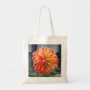 Orange und gelbe Dahlie auf einer Taschentasche Tragetasche