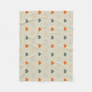 Orange- und Grün-Herz-Rastermuster Fleecedecke