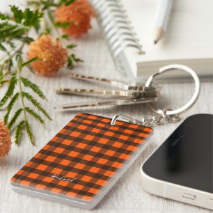Orange und schwarzes Karo Schlüsselanhänger