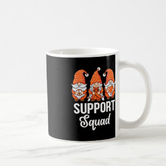 Orangefarbene Bänder unterstützen Überlebende von  Kaffeetasse