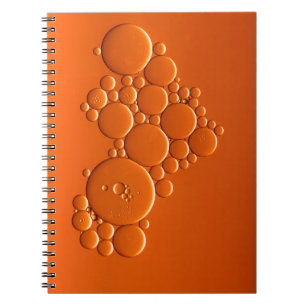 Orangefarbene Blasen Notizblock