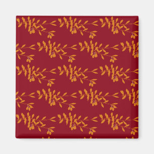 Orangefarbene Blätter der Silhouette auf rot Magnet