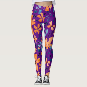 Orangefarbene Blume und blaue Blätter auf durchsic Leggings