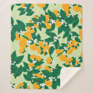 Orangefarbene Früchte: Vintages grünes Muster. Sherpadecke