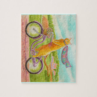 Orangefarbene Katze auf einem Lila Fahrrad Puzzle