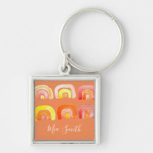 Orangefarbene Regenbogen-niedliche Retrografik Schlüsselanhänger