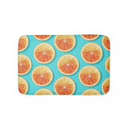 Orangefarbene Scheiben auf blau Badematte