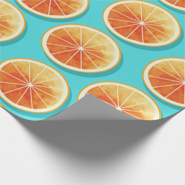 Orangefarbene Scheiben auf blau Geschenkpapier (Ecke)