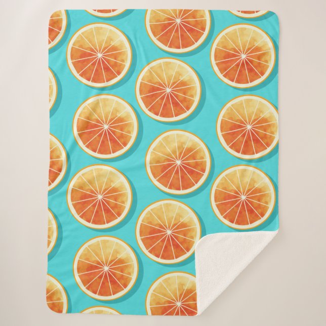 Orangefarbene Scheiben auf blau Sherpadecke (Vorderseite)